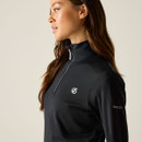 A woman in a black zip-up top with a stand collar and logo on the chest and sleeve, featuring a sleek design.