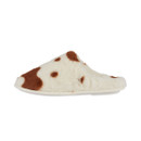 A cream fur mule slipper with brown cow print spots, featuring a rounded toe and soft sole.