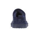 Rear view of a navy blue slipper with a soft lining and a low-profile sole.