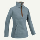 Light blue 1/2 zip sherpa fleece pullover with a high collar and two front pockets, displayed on a plain background.