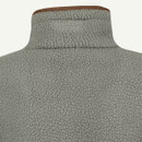 Close-up of the high collar on a sage green textured fleece pullover with brown edging.