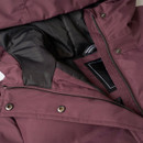 Close-up of dark purple padded coat showing the inner lining, zip and press-stud fastening details.