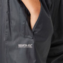 Close-up of navy Regatta Stormbreak waterproof overtrousers showing side pocket and Regatta Great Outdoors logo.