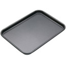 MasterClass 18 x 24cm non-stick baking tray with raised edges, ideal for baking biscuits, pastries and other oven-baked foods.