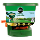 Green Miracle-Gro Handy Spreader package for lawn care, featuring an image of seed spreading. Keywords include "arm support" and "easy to use."