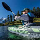 Person paddling an Intex Challenger K1 inflatable kayak on a lake