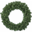 Artificial pine Christmas wreath with dense green evergreen foliage, ideal for decorating doors, walls and festive seasonal displays.