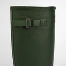 Detailed view of adjustable buckle strap on green Barbour rubber wellington boots.