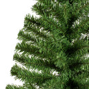 Close-up of lush, green artificial Christmas tree branches against a white background.