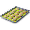 Zeal silicone baking sheet shown on an oven tray with freshly baked cookies, providing a reusable non-stick baking surface.
