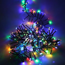NOMA multi-colour LED cluster lights illuminated on a dark background, creating a vibrant festive display with densely packed red, blue, green and warm white LEDs.