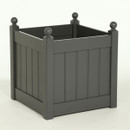 Charcoal grey wooden trough planter, square painted timber box with recessed panel sides and ball finial corner posts on a white background.