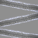 The NOMA 480 Multi-Function Cluster LED Lights White - 7m in a zig zag design on a grey background