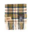 A folded tartan scarf in blue, green, and beige plaid pattern with fringed edges. Two labels are attached, one reading "Barbour," conveying a classic, cosy feel.