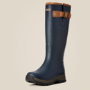 A knee-high navy blue rubber boot with a brown strap and buckle at the top. The sole is rugged black, suggesting durability and comfort. Neutral background.