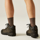 Rear view of brown waterproof walking boots showing padded ankle support and Vibram grip soles.