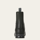 Back view of a sleek black leather boot with a pull-tab labeled "Ariat" on a light background. The boot's design is sturdy and elegant.