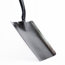 Close-up of the black steel digging spade blade with a slightly curved profile for digging and moving soil.