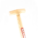 Close-up of the natural wooden T-grip handle on the long-handled garden hoe.