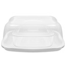 A clear plastic cake storage container with a smaller storage box contained within.