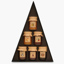 Open view of Edinburgh Preserves The Christmas Tree gift set showing six jars of jams and chutneys neatly packed in a triangular box