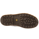 The brown rubber outsole of a work boot with deep tread patterns and a small yellow brand logo in the center.