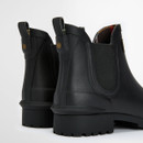 Rear angled view of black Barbour Chelsea wellington boots showing heel structure and branding
