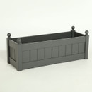 Charcoal-coloured rectangular garden planter with panelled sides and corner ball finials, shown on a plain background.