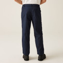 Back view of navy blue utility work pants featuring rear patch pockets, straight leg fit, side cargo pocket, and structured waistband for functional workwear design