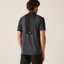 Back view of men’s charcoal and black technical polo shirt with contrast panel design, breathable fabric, and subtle logo centered on upper back