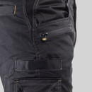 Close-up of zipped pocket on black CAT trousers with branded CAT zip pull and reinforced stitching