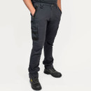 Men’s charcoal grey work trousers with slim fit, featuring multiple utility pockets, reinforced knee panels and worn with safety boots.