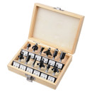 A wooden box is open, displaying an organized set of metal router bits, each in its own compartment. The bits are shiny, new, and varied in shape.