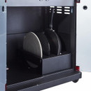 Interior view of a storage cabinet featuring two round grill plates and a grilling spatula, organized for easy access.