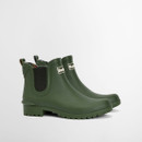 Pair of green Barbour Chelsea wellington boots with elastic side panels, photographed on a white studio background.