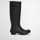 Side profile of a single black Barbour knee-high wellington boot with chunky tread sole and buckle detail.