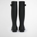 Rear view of black Barbour knee-high wellington boots showing straight leg shape and sturdy heel.