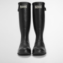 Front view of black Barbour wellington boots standing upright, showing rounded toe shape and logo badge.
