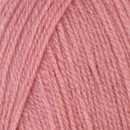 Close-up of tightly twisted mustard-yellow yarn strands arranged diagonally, showing the texture and weave of the wool.