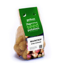 A mesh bag of King Edward seed potatoes with green branding, labeled "2kg Premium Scottish Seed Potatoes, Maincrop" by Jamieson Brothers.