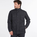 A man wearing a navy jacket