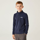 Keep them snug through spring breezes and summer evenings with the Regatta Children’s Hot Shot II Quarter Zip Fleece. Lightweight, soft, and easy to wear, it’s a brilliant choice for active days outdoors or layering up on cooler mornings.

Made from warm, brushed-back fleece, this kids’ quarter zip fleece is soft on the inside and smart on the outside. The cosy fabric keeps the chill out without being bulky – just right for running around the garden, heading to school, or weekend walks with the family.

Designed with a comfortable regular fit, it slips on easily over a t-shirt and under a jacket when needed. The quarter zip front lets them adjust their temperature, while the long sleeves and V-neckline offer good coverage with room to move.

Featuring the Regatta Outdoors logo on the chest, it’s a reliable wardrobe staple that looks the part and wears well. Made from 100% polyester, it's low-fuss to wash and care for – great news for busy households.

Add this easygoing fleece to their everyday rotation – ideal for spring layering or breezy summer days.
