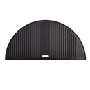 Black cast iron grill pan with ridged surface, shaped like a semicircle, ideal for grilling meats and vegetables.