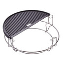 Half-moon grill grate made of black metal with a ribbed surface, attached to a shiny silver support frame.