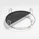 A round, half-moon grilling grate with stainless steel supports and black, striped cooking surface, designed for outdoor use.