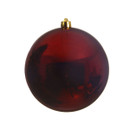 A large glossy oxblood red bauble against a white background.