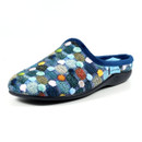 Side view of a Lunar slip-on mule slipper featuring a textured, multicoloured polka dot knit pattern, dark blue trim, cushioned blue interior, and a supportive black outsole.