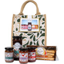 Bramble Foods savoury jute hamper gift set with cheese straws, cheeseboard chutney, chilli jam, sun-dried tomato and smoked garlic chutney, and spicy plum chutney.