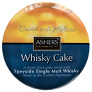 Round tin labelled "Ashers Whisky Cake" with a sunset gradient background. Text describes it as "Sweet and Mellow" with Speyside Single Malt Whisky.