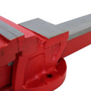 A red fixed base cast iron vice on a white background.